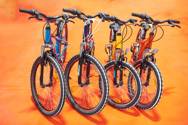 Modern mountain bikes in sports shop Row modern mountain bikes in sports shop bicycle shop stock pictures, royalty-free photos & images