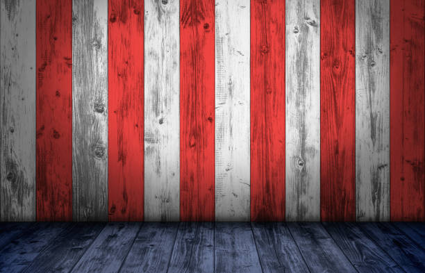 Wood wall and floor painted to replicate the American flag colors. Free space for text or product stock photo