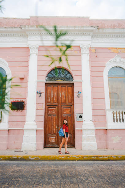 istock Woman walking in Merida in Mexico 1393357077