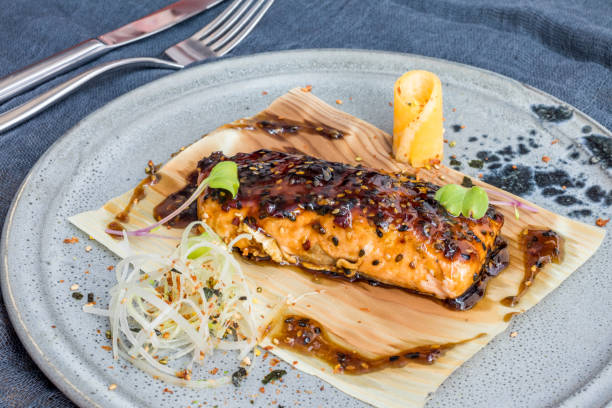 istock salmon steak with teriyaki sauce on grey plate 1393359634