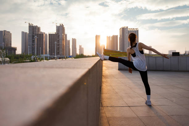istock Female exercising in an urban environment 1393359844
