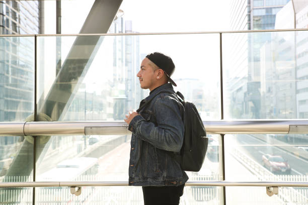 istock Young man having arrived or are departing for a vacation 1393362384
