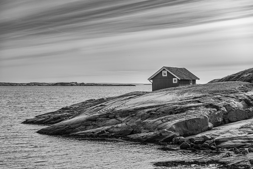 Small idyllic cottage on an islet