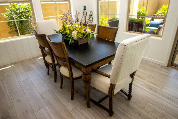 istock Dining Area Wooden Table And Chairs With Centerpiece 1393371972