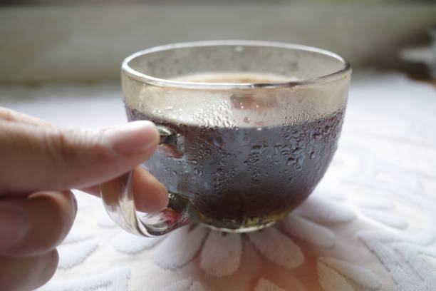 Holding a cup of delicious American coffee
