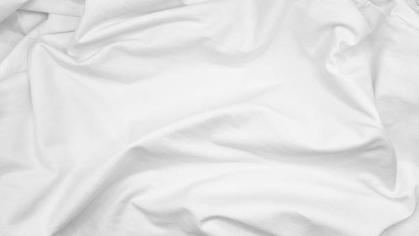 istock natural fabric cloth texture used for design. drapery textured. canvas for background. image has shallow depth of field. white cloth texture background for romantic or stylish mood and tone. 1393375296