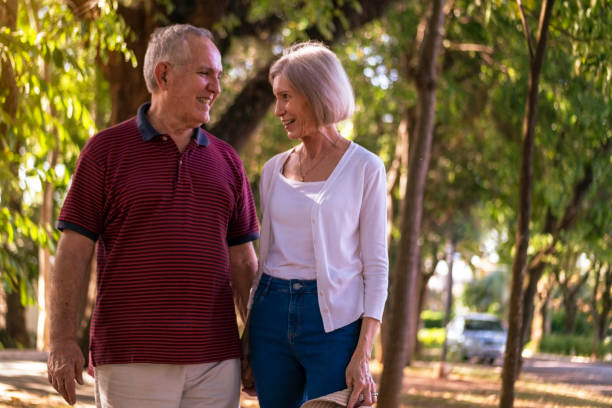 istock Mature couple at a park 1393379023