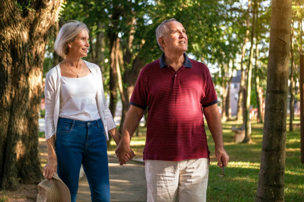 istock Mature couple at a park 1393379061