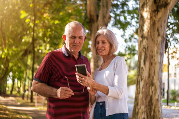istock Mature couple at a park 1393379166
