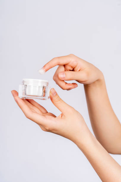 istock A pair of female hands hold makeup 1393379214