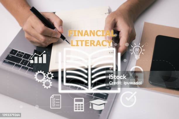 Person Idea Of Financial Literacy And Education Is Based On Learning From Books Reading Classes Can Help You Gain Economic Information And Improve Personal Abilities Money Management And Planning Stock Photo - Download Image Now