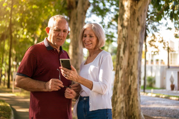 istock Mature couple at a park 1393379325