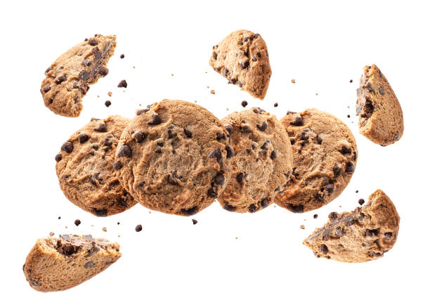 collection of broken chocolate chip cookies. cookies broken in pieces with crumbs on white background. - crumble imagens e fotografias de stock