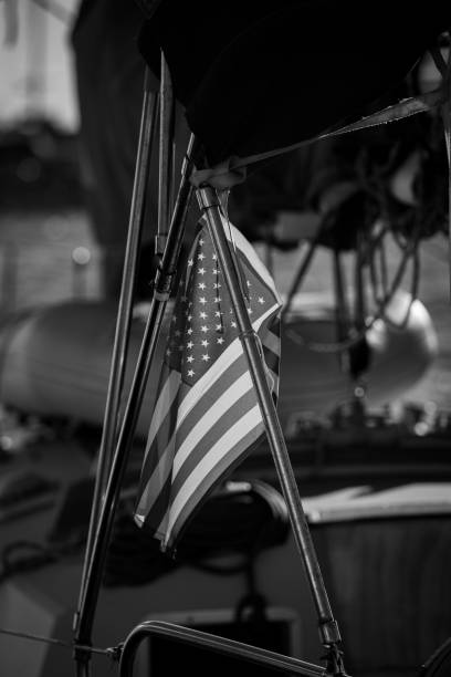 istock American flag hanging down from a boat. 1393380182
