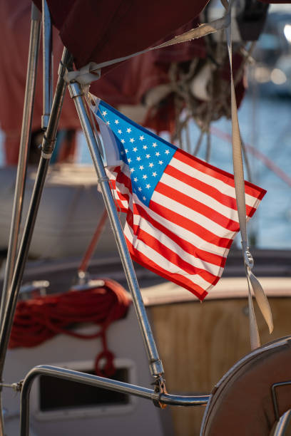 istock American flag hanging down from a boat. 1393380184