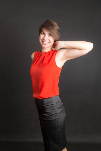 studio portrait of a woman on a black background