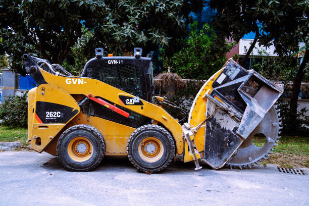 Laughlin, Nevada, USA - March 1, 2013: Caterpillar D10N track-type tractors and scrapers sit idle four and one-half years after the housing and construction market collapse at a project site in Laughlin, Nevada.