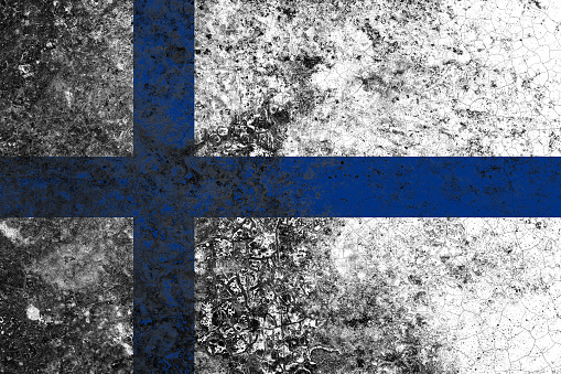 Finland flag on a damaged old concrete wall surface