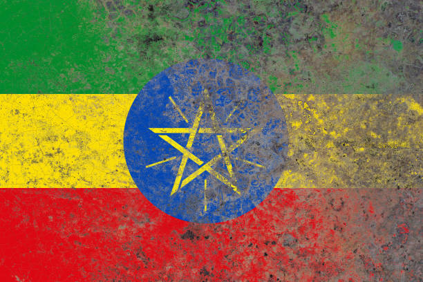 istock Ethiopia flag on a damaged old concrete wall surface 1393398500