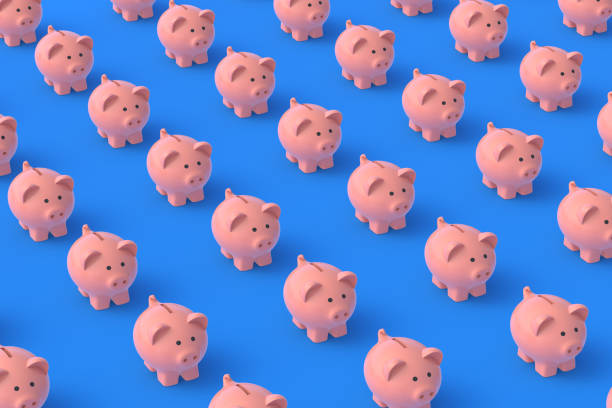 istock Rows of piggy banks on blue background. 3d render 1393398511