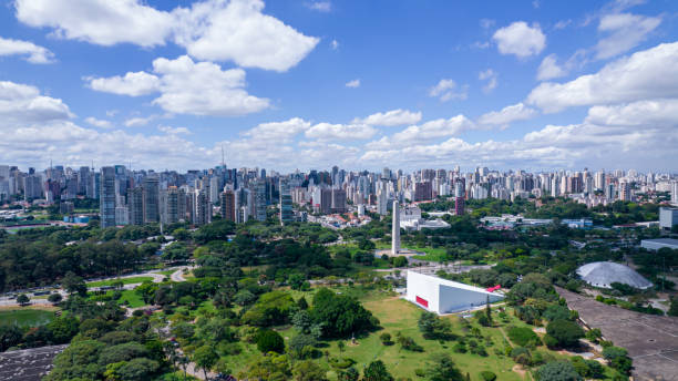 Aerial view of Ibirapuera Park in São Paulo, SP. Residential buildings around. Lake in Ibirapuera Park Aerial view of Ibirapuera Park in São Paulo, SP. Residential buildings around. Lake in Ibirapuera Park. ibirapuera park stock pictures, royalty-free photos & images