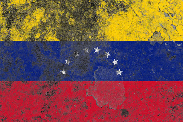 istock Venezuela flag on a damaged old concrete wall surface 1393398850