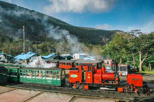 The southernmost railway in the world in Ushuaia, Argentina. Trains are ready to depart with tourists.