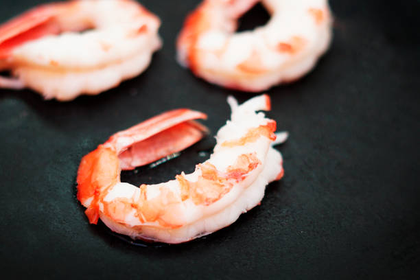 High angle view of shrimps over black background