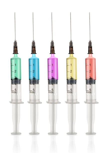 istock Few medical syringes close up isolated on white background 1393402191