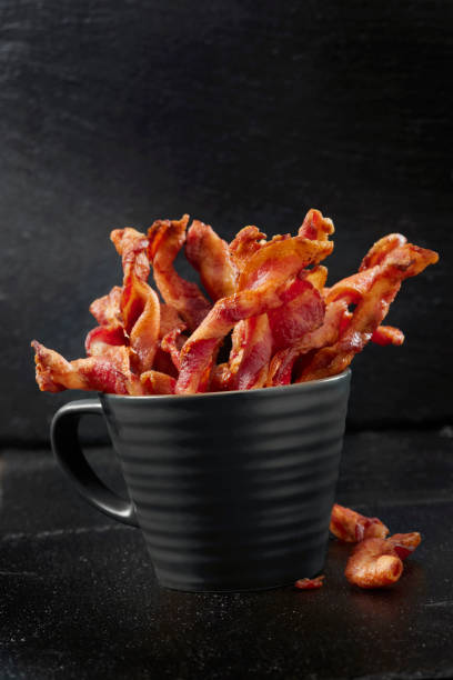 Spiraled  Thick Cut Bacon with Maple Syrup Sauce Spiraled  Thick Cut Bacon with Maple Syrup Sauce Made Famous on Social Media twisted bacon stock pictures, royalty-free photos & images