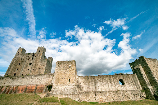 Rochester Castle in Kent, England, which was opened in 1087 in the Norman style. Built with Kentish ragstone, the keep or tower dates from 12th century.