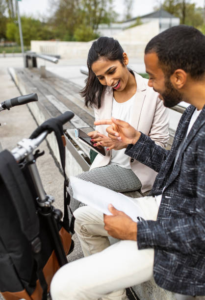 istock Business people discussing outdoors 1393409535