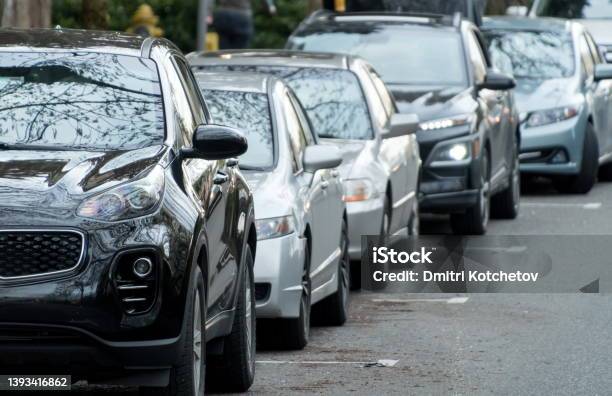 Long Row Of Cars And Suvs Parallelly Parked Near Redmond Town Center Stock Photo - Download Image Now