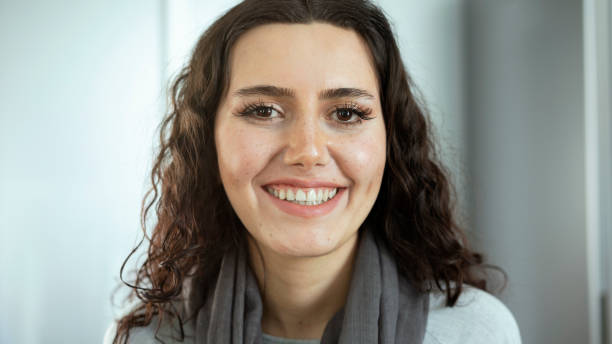 istock Young woman looking at camera 1393418848