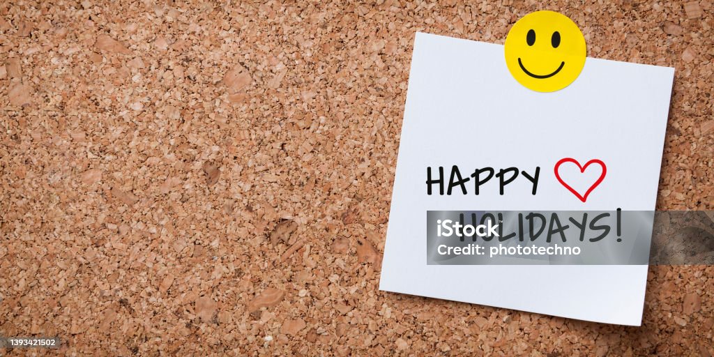 White Sticky Note With Happy Holidays And Red Push Pin On Cork Board Happiness Stock Photo