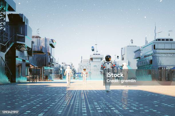 Futuristic Exo Planet Base Colony With Astronauts Walking Stock Photo - Download Image Now