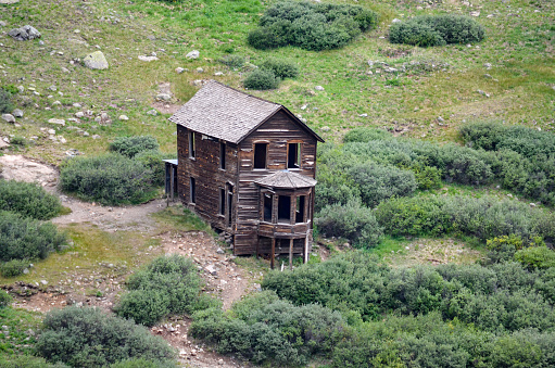 Old house at ghost town Animas Forks - Cinnamon Pass dirt road high in the San Juan Mountains between Silverton, Ouray and Lake City, Colorado in western United States of America (USA).