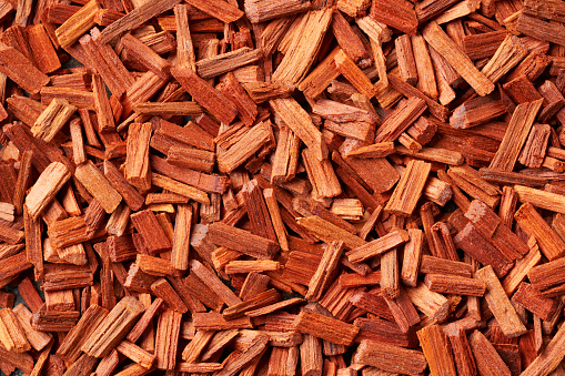 Closeup of red sandalwood chips - ingredient for aromatherapy oils