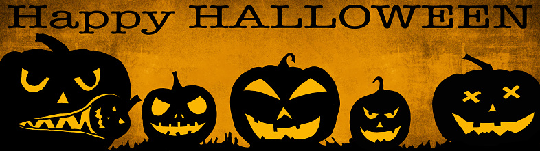 HALLOWEEN background banner wide panoramic panorama template -Silhouette of scary carved luminous cartoon pumpkins and cross isolated on dark orange yellow texture in a cemetery