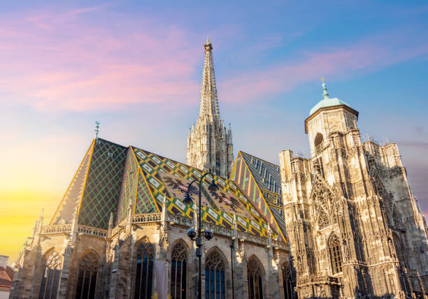 St. Stephen's cathedral on Stephansplatz square at sunrise, Vienna, Austria St. Stephen's cathedral on Stephansplatz square at sunrise, Vienna, Austria st. stephens cathedral vienna photos stock pictures, royalty-free photos & images