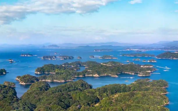Beautiful bird's-eye view of a seascape of the Kujkushima islands that lie off sasebo famous for its saw-toothed coast with multiple islets part of Saikai National Park in Kyushu.