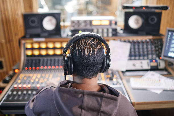 istock Musician at Audio Workstation 1393425451