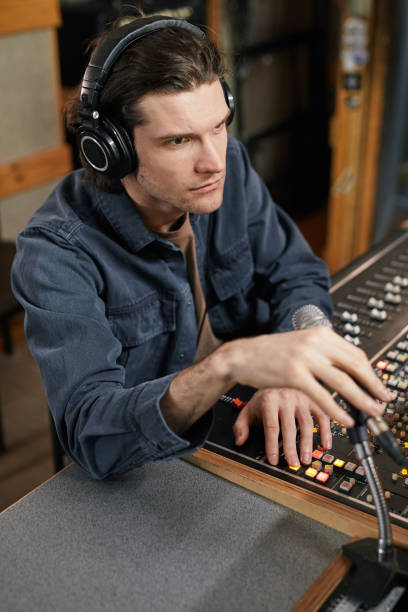 istock Music Producer in Record Studio 1393425475