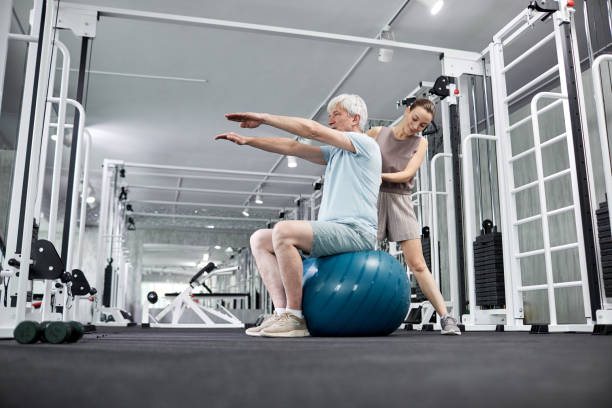 istock Female Therapist Working with Senior Patient 1393428266