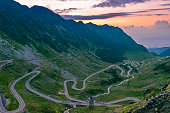 Beautiful landscape of high green mountains and turns of Transfagarasan road