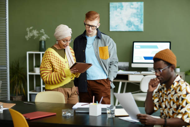 istock Colorful Business People in Office 1393432876