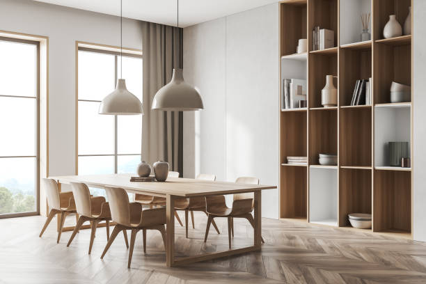 istock Light dining room interior with chairs and window, shelf with decoration 1393436385