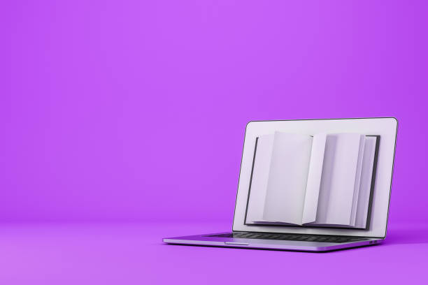 istock Laptop and opened book on the screen, library. Mockup 1393436468
