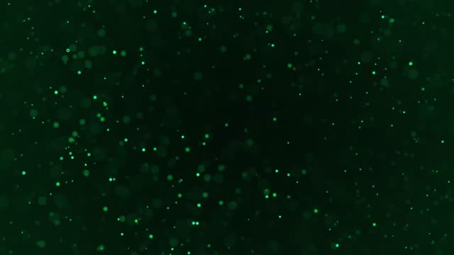 Glittering Green Particles in Slow Motion - Glamour, Christmas, Celebration, Sideways - Abstract Background Animation - Loopable stock video