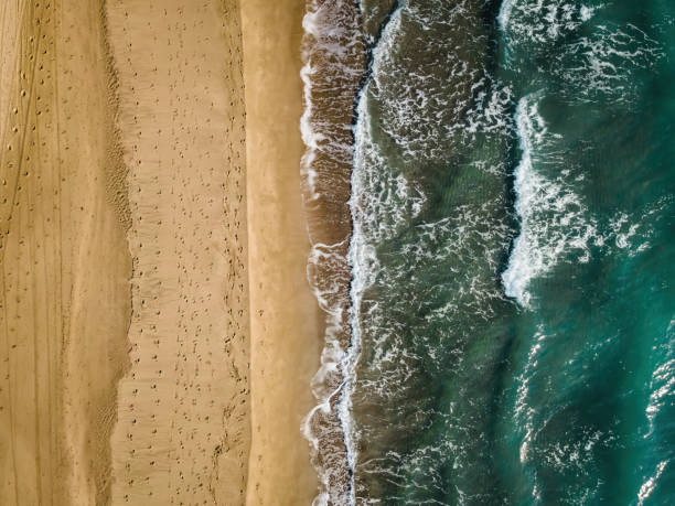 Aerial view of Patara beach, top down view of clear turquoise sea and waves stock photo